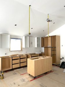 kitchen cabinets and light fixture placement