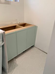 laundry mint green cabinets